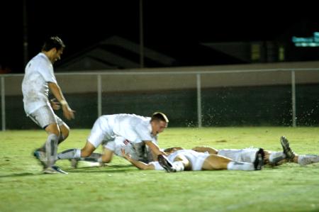 The Union Bulldogs celebrate after a goal scored by senior Scott <em>Sinky</em> Sinclair in Union's 2-1 win over Trevecca Nazarene. - Photo by Matt Elia
