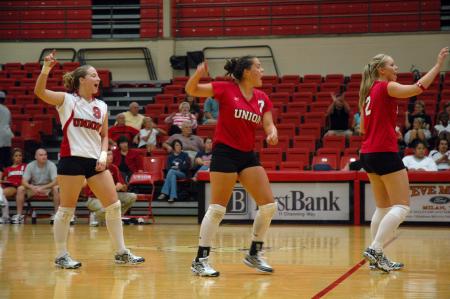 (From left to right) Junior Cassi Hobbs, Senior Lindsey Wallach, and Junior CJ Neathamer celebrate as they score against Trevecca Nazarene University.  - Photo by Neisha Fuson