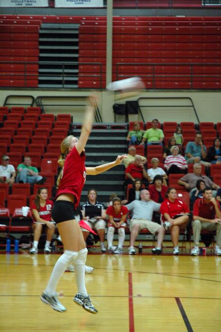 Junior Amanda Hutchison Coyle forcefully hits the volleyball over to Trevecca Nazarene University.  - Photo by Neisha Fuson