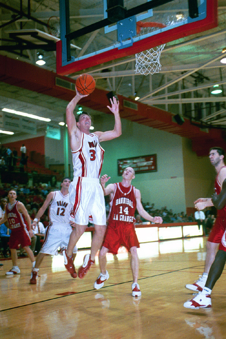 Freshman Matt Trammell (35) gets easly layup. - Photo by Justin Veneman