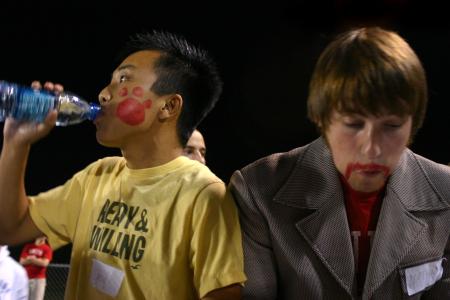 Freshmen Chawalit Wongkhaio and Nathan Fisher participate in the Chick-fil-A Nugget Eating Contest. - Photo by Stephanie Schroeder
