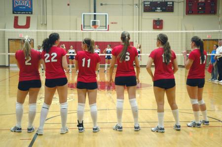 The Lady Bulldogs wait in line to be introduced during their match with Mid-Continent University.  - Photo by Neisha Fuson