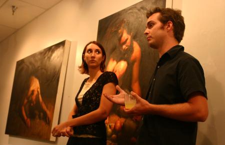 Rebecca and Steve Forester talk about their work displayed in the art gallery. Their show will be displayed Sept. 14 - Oct. 10, 2007. - Photo by Stephanie Schroeder