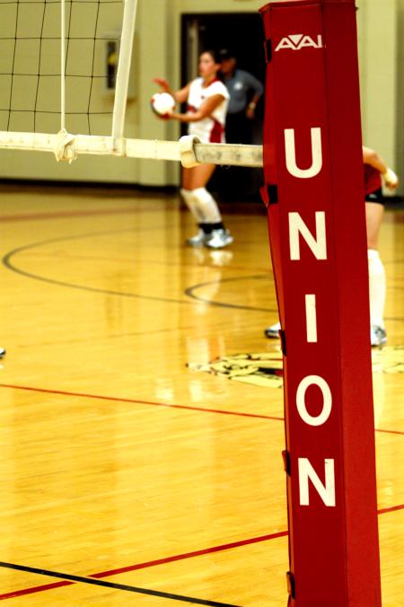 The Lady Bulldog volleyball team gets off to a good start against cross-town rival Freed-Hardeman. - Photo by Matt Elia