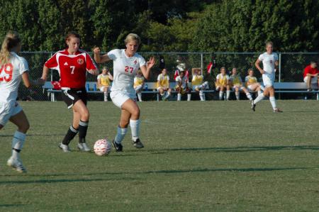 Sophomore Katelin Dirksen tries to steal the ball back from Lyon College.  - Photo by Neisha Fuson