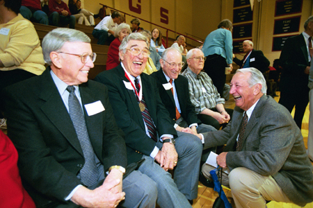 Members of Union football teams relive good times during Homecoming 2003.  Pictured from left to right are Bill Gregory ('50), Ray House ('50), Fred Crosson ('50), Clay Doty ('52), and Bob Childers ('53). - Photo by Jim Veneman
