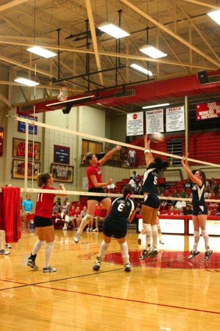 Junior Emilie Ogas spikes the ball in a Union win over Lambuth University. - Photo by Stephanie Schroeder