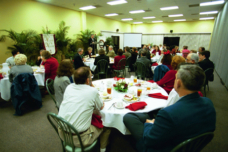 Science alumni gathered at the Science Alumni Symposium and Dinner sponsored by the Department of Chemistry and Physics during Homecoming 2003. - Photo by Jim Veneman