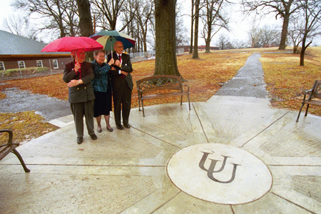 Ramona Mercer and the Alexanders brave the weather to visit the old Union campus in downtown Jackson during Homecoming 2003. - Photo by Jim Veneman
