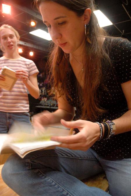 Senior Catherine Schulz flips through her script during a rehearsal for the play <em>The Dining Room</em>.  - Photo by Neisha Fuson