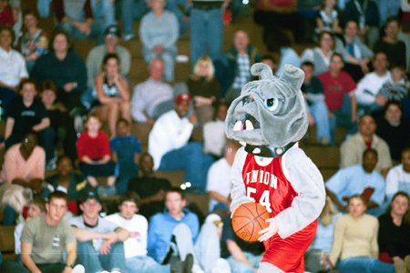 Buster takes the ceremonial first shot for $10,000 Halfcourt shot during Homecoming 2003.  - Photo by Justin Veneman