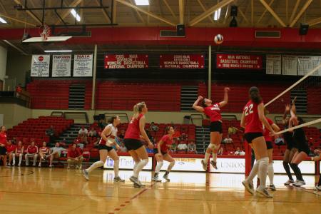 Junior Tivent Catrett attacks the ball in a match versus Martin Methodist College (Tenn.). - Photo by Stephanie Schroeder