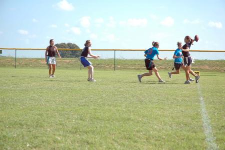 Two independent flag football teams battled it out on a warm and sunny Saturday during Family Weekend.  - Photo by Neisha Fuson