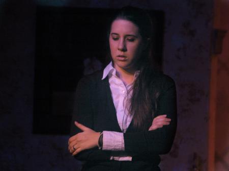 Catherine Schulz performs in <em>The Dining Room</em>. - Photo by Matthew Diggs