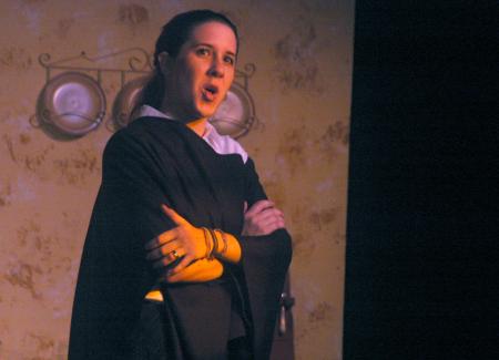 Catherine Schulz performs in <em>The Dining Room</em>.  - Photo by Matthew Diggs