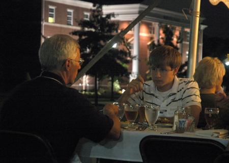 Freshman Kevin Reid and his father enjoyed a meal on the Great Lawn during Family Weekend. - Photo by Matthew Diggs