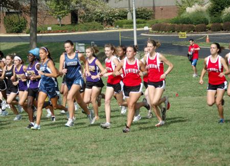 Runners sprint from the starting line in the Union Cross Country Invitational.  Union captured the race title. - Photo by Tommy Sadler