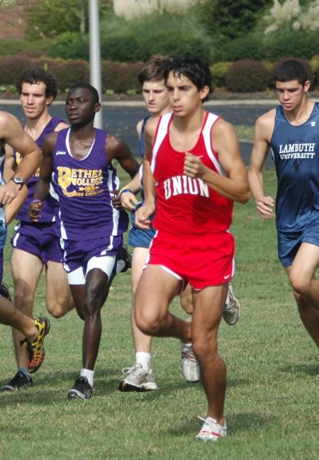 Phillip Thompson tries to separate himself from the rest of the pack in the Union Cross Country Invitational.  Thompson finished fourth and the Union team finished first. - Photo by Tommy Sadler