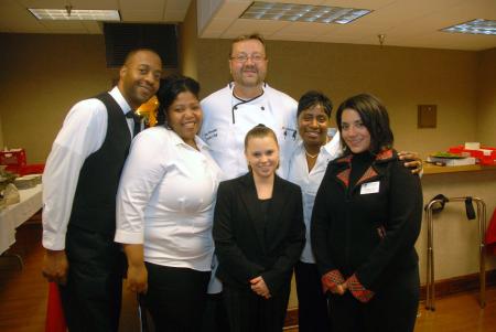 Chef Greg Kernodle and his team prepare to serve dinner to the Scholarship Banquet audience. - Photo by Morris Abernathy