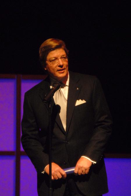 Gary Grisham '75, president of lead sponsor BancorpSouth, introduces the Andrew Card and Leon Panetta at the Eleventh Annual Scholarship Banquet.  - Photo by Morris Abernathy