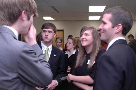 Jason Castles (far right) chats with student leaders after meeting with Andrew Card and Leon Panetta prior to the  Scholarship Banquet.  - Photo by Neisha Fuson