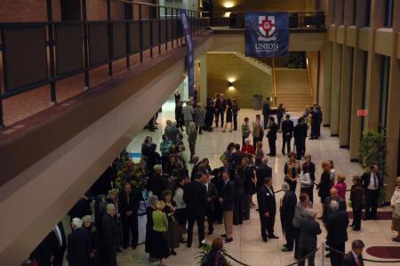 Before dinner was served at the Scholarship Banquet, guests met in the lobby of the Civic Center and were able to fellowship before the speakers Card and Panetta shared their stories.  - Photo by Neisha Fuson