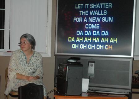 Natalie Newberry dressed as an old woman and really played her part well. Even during a passionate karaoke song, the little old lady remained in character.  - Photo by Neisha Fuson