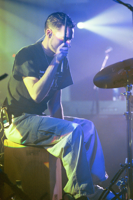 Jeremy Camp's percussionist Leaf plays the Cajon, a unique box-shaped instrument from Germany. - Photo by Lindsay Stavish