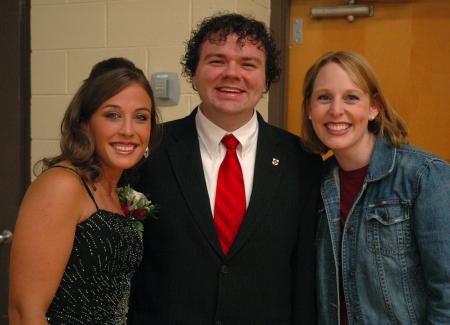 Candace Cross, Josh Clarke and Dean Kimberly Thornbury pose for a picture right before half-time of the Lady Bulldog's Homecoming game.  - Photo by Neisha Fuson