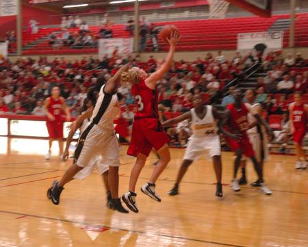Union junior Crystal Eason (3) goes up for a lay up in the game against Harris-Stowe State College (Mo.).  - Photo by Neisha Fuson