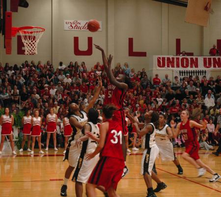 Junior Josephine Owino takes a shot during the Homecoming win over Harris-Stowe State College (Mo.).  - Photo by Neisha Fuson