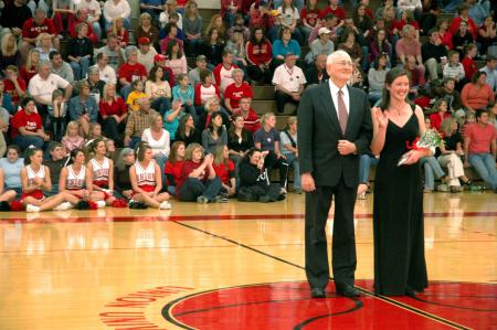 Sophomore Kelly Reed was escorted by her grandfather during the presentation of the 2007 Homecoming Court.  - Photo by Neisha Fuson