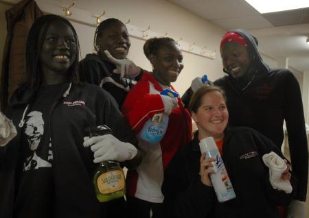 Members of the Lady Bulldog basketball team pose for a fun picture during their volunteer time at J-Crib ministries for Day of Remembrance.  - Photo by Neisha Fuson