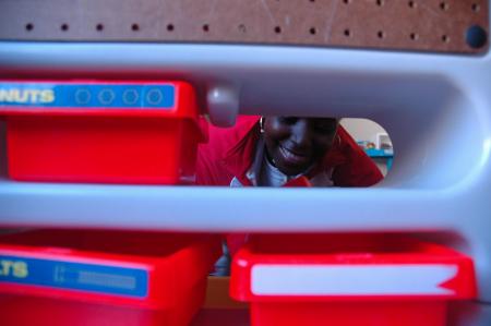 Cleaning the toys for J-Crib Ministries was an important job for this year's work on the Day of Remembrance.  - Photo by Neisha Fuson