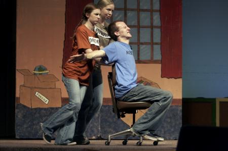 Angela Abbamonte and Jessica Gillard help Alexander, played by Kip Arrowood, with his problem of moving away from home in the fall children's show. - Photo by Kyle Kurlick