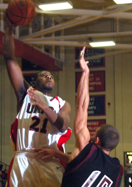 Union junior Brian Lake takes a shot over a defender in Union's Homecoming victory over Campbellsville University (Ky.). - Photo by Matthew Diggs