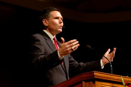 Poplar Heights Baptist Church pastor Patrick McGill addresses students in the Friday chapel service of Homecoming week. - Photo by Matt Elia