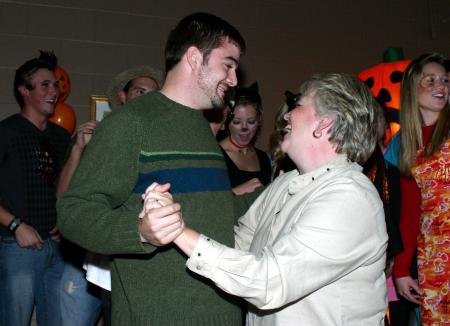 Ben Dockery dances with his mother and First Lady Lanese Dockery as the freshman class sing a karaoke song. - Photo by Stephanie Schroeder