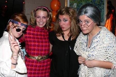 Seniors Kinsey Bolinger, Emily Watlington, Brittany Howerton and Natalie Newberry attend the Costume Coffee House in Hurt Commons. - Photo by Stephanie Schroeder