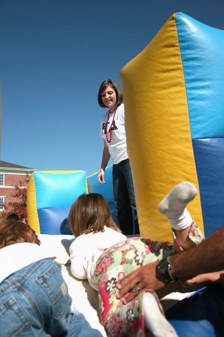 Miranda Lindsey, sophomore education major, works for S.T.E.A. during Homecoming's Arts in the Park. - Photo by Kristi McMurry Woody