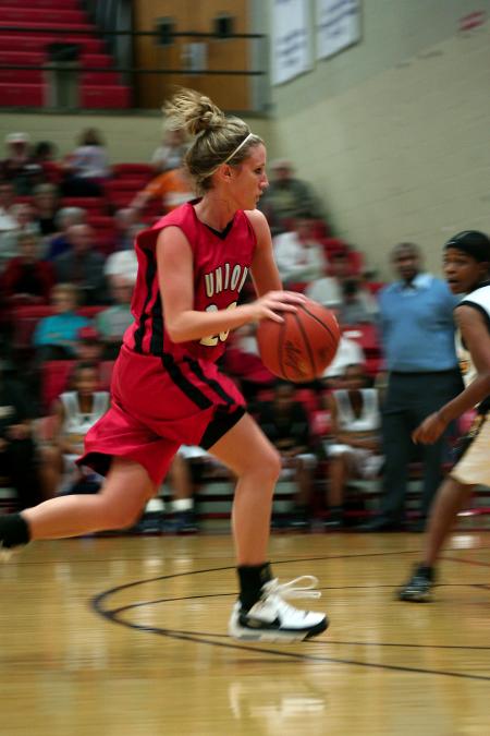 Union freshman Kayla Hudson drives the lane during Union's Homecoming victory over Harris-Stowe State College (Mo.). - Photo by Kristi McMurry Woody