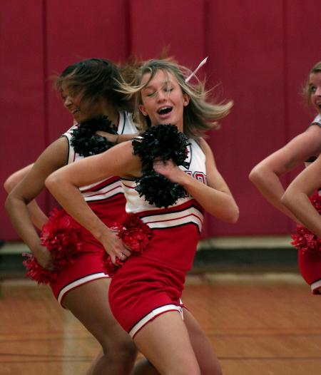 Brooke Pearson, junior Learning Foundations major, dances for halftime with the Union cheerleaders. - Photo by Kristi McMurry Woody