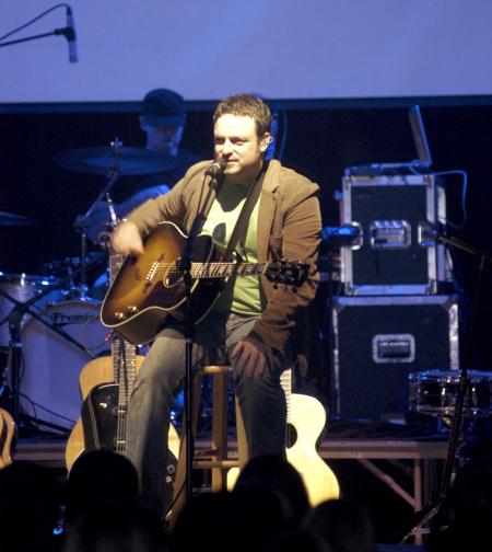 Shane Barnard of Shane & Shane talks to the Homecoming concert audience. - Photo by Jordan Buie