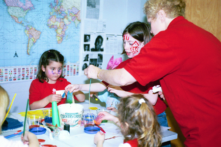 Union's STEA held Family Friendly Activities & Bulldog Camp again this year as a part of Homecoming 2003.  Pictured here Carolyn Whaley works with some campers on crafts.
 - Photo by Kristen Hiller
