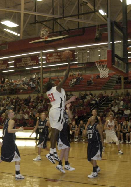 Union junior Josephine Owino lays the ball in for two points. - Photo by Jordan Buie