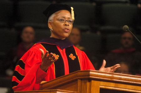 Deborah Wilds, president and chief operating officer of College Success Foundation, brings the commencement address for the Fall graduation service.   - Photo by Matthew Diggs