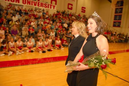 Senior Kirby Maxwell smiles at friends after being crowned Homecoming Queen. - Photo by Morris Abernathy