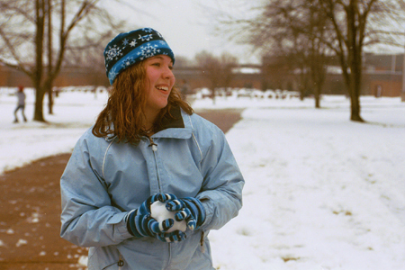 Freshman Heather Phillips enjoys the snow.
 - Photo by Justin Veneman