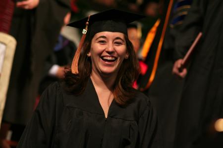 Sara Harlow flashes a big smile after receiving her diploma at the fall graduation ceremony. - Photo by Kristi McMurry Woody