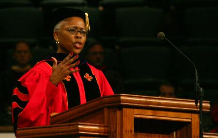 Deborah Wilds gives the commencement address, <em>Loving God with Our Minds and Serving with Our Hearts</em>, during the fall graduation ceremony. - Photo by Stephanie Schroeder